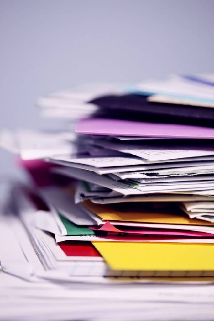 The Benefits of Hiring a CFO Outsourced for Your Business Growth 3 pile of printing papers